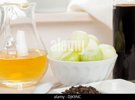 Pickling onions pickled in dark balsamic vinegar ingredients Stock Photo