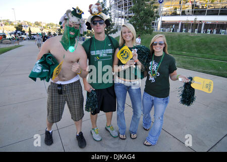 Sep. 04, 2010 - Denver, Colorado, United States of America - A gathering of Colorado State fans pose for a picture before the Rocky Mountain Showdown game between the Colorado State Rams and the Colorado Buffaloes at invesco Field at Mile High. (Credit Image: © Andrew Fielding/Southcreek Global/ZUMApress.com) Stock Photo