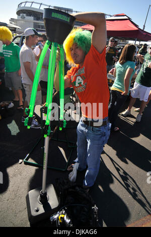 Sep. 04, 2010 - Denver, Colorado, United States of America - A Colorado State fan sets up a beer bong before the Rocky Mountain Showdown game between the Colorado State Rams and the Colorado Buffaloes at invesco Field at Mile High. (Credit Image: © Andrew Fielding/Southcreek Global/ZUMApress.com) Stock Photo