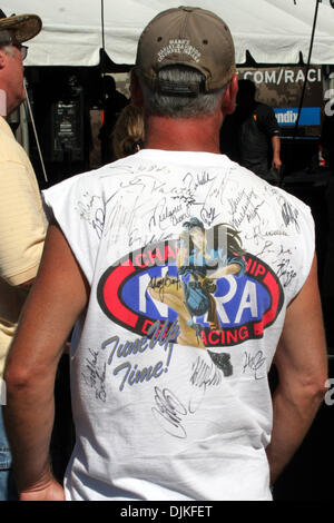 Sep. 05, 2010 - Indianapolis, Indiana, United States of America - 05 September 2010: Autographs cover the entire back of his NHRA fan's t-shirt. The Mac Tools U.S. Nationals were held at O'Reilly Raceway Park in Indianapolis, Indiana. (Credit Image: © Alan Ashley/Southcreek Global/ZUMApress.com) Stock Photo