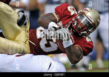 Sept. 7, 2010 - Jacksonville, Florida, United States of America - January 4, 2010: FSU RB Chris Thompson dives over the Samford line for extra yards just short of the goal line. FSU defeated Samford 59-6 at Doak Campbell Stadium in Tallahassee, Florida. (Credit Image: © Mike Olivella/ZUMApress.com) Stock Photo