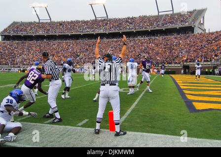 Sept. 11, 2010 - Greenville, North Carolina, United States of America - The referee signals another touchdown for ECU during the game between the East Carolina Pirates and the Memphis Tigers at Dowdy-Ficklen Stadium.  The Pirates defeated the Tigers 49-27. (Credit Image: © David Friend/Southcreek Global/ZUMApress.com) Stock Photo