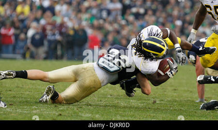 Sept. 11, 2010 - South Bend, in, usa - University of Michigan running back Vincent Smith is leveled by Notre Dame safety Harrison Smith Saturday September 11, 2010 at Notre Dame Stadium in South Bend, Indiana.  Michigan beat Notre Dame 28-24. (Credit Image: © Jim Z. Rider/ZUMApress.com) Stock Photo