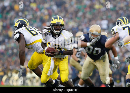 Sept. 11, 2010 - South Bend, Indiana, USA - University of Michigan quarterback Denard Robinson considers his options Saturday September 11, 2010 against the University of Notre Dame at Notre Dame Stadium in South Bend, Indiana.  Michigan beat Notre Dame 28-24. (Credit Image: © Jim Z. Rider/ZUMApress.com) Stock Photo