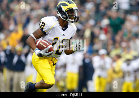 Sept. 11, 2010 - South Bend, Indiana, USA - University of Michigan receiver Roy Roundtree cracks a smile as he scores untouched against Notre Dame Saturday September 11, 2010 at Notre Dame Stadium in South Bend, Indiana.  Michigan beat Notre Dame 28-24. (Credit Image: © Jim Z. Rider/ZUMApress.com) Stock Photo