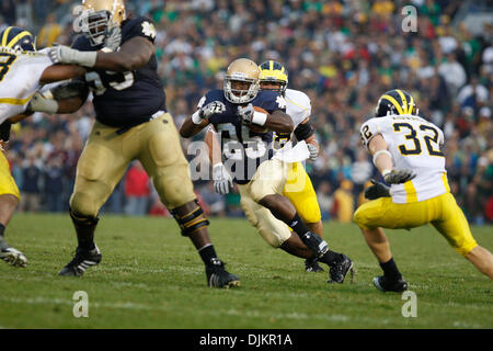 Sept. 11, 2010 - South Bend, Indiana, USA - University of Notre Dame tailback Jonas Gray makes his way through the University of Michigan defense Saturday September 11, 2010 at Notre Dame Stadium in South Bend, Indiana.  Michigan beat Notre Dame 28-24. (Credit Image: © Jim Z. Rider/ZUMApress.com) Stock Photo