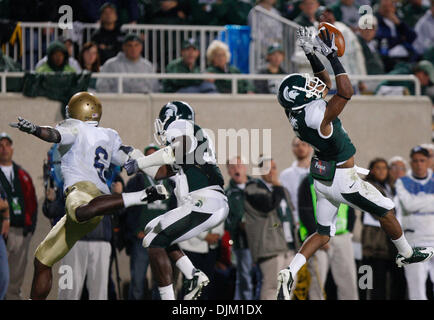 Sept. 18, 2010 - East Lansing, Mi, USA - Michigan State cornerback Johnny Adams intercepts a pass intended for Notre Dame wide receiver Theo Riddick in the first half Saturday September 18, 2010 at Spartan Stadium in East Lansing, Michigan.  Michigan State defeated Notre Dame 34-31. (Credit Image: © Jim Z. Rider/ZUMApress.com) Stock Photo