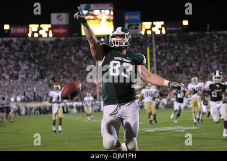 Sept. 18, 2010 - East Lansing, Michigan, United States of America - Michigan State Spartans tight end Charlie Gantt (83) catches the game winning touchdown pass on a fake field goal in overtime to beat the Notre Dame Fighting Irish 34-31 at Spartan Stadium. (Credit Image: © Rey Del Rio/Southcreek Global/ZUMApress.com) Stock Photo