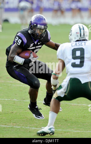 Tcu Horned Frogs Running Back Aaron Green (22) Breaks Away From Kansas 