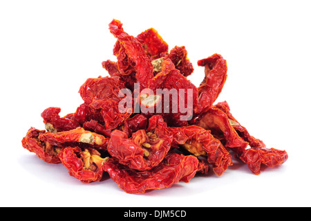 a pile of sun-dried tomatoes on a white background Stock Photo