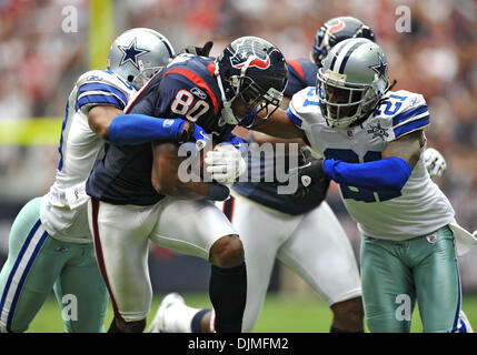 Dallas Cowboys free safety Gerald Sensabaugh (43) limps off the field in  the last seconds of the team's loss at CenturyLink Field in Seattle,  Washington, Sunday, September 16, 2012. The Seattle Seahawks