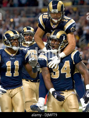 St. Louis Rams Kenneth Darby, center, is surrounded by his teammates ...