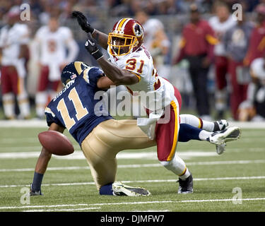 Sep 26, 2010 - St Louis, Missouri, U.S. - Washington defensive back PHILLIP BUCHANON (31) gets tangled up with St. Louis receiver BRANDON GIBSON (11) in the game between the St. Louis Rams and the Washington Redskins at the Edward Jones Dome. The Rams defeated the Redskins 30 to 16. (Credit Image: © Mike Granse/ZUMApress.com) Stock Photo