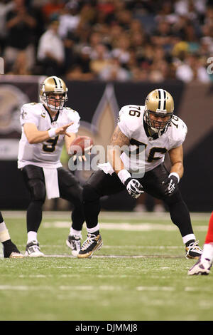 New Orleans Saints center Jonathan Goodwin (76) and New Orleans Saints ...