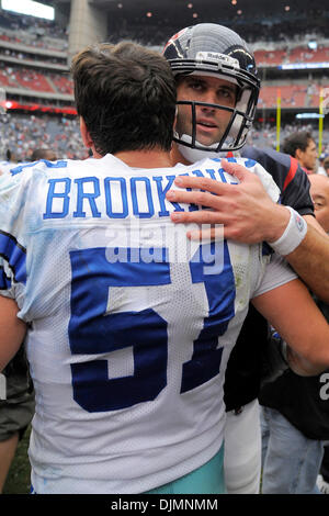 Sept. 26, 2010 - Houston, Texas, United States of America - Former teammates Dallas Cowboys linebacker Keith Brooking (51) and Houston Texans quarterback Matt Schaub (8) hug after the game between the Houston Texans and the Dallas Cowboys. The Cowboys defeated the Texans 27-13. (Credit Image: © Jerome Miron/Southcreek Global/ZUMApress.com) Stock Photo