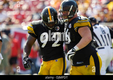 Sep. 26, 2010 - Tampa, Florida, United States of America - Pittsburgh Steelers linebacker James Harrison (92) helps teammate Pittsburgh Steelers defensive tackle Chris Hoke (76) off the field late in the fourth quater. The Tampa Buccaneers fall to the Pittsburgh Steelers 38-13 at Raymond James Stadium in Tampa, Florida. (Credit Image: © Anthony Smith/Southcreek Global/ZUMApress.com Stock Photo