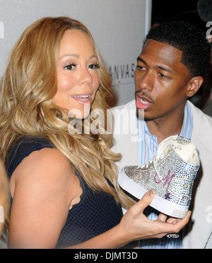 Mariah Carey and her husband Nick Cannon leaving the Dorchestser Hotel ...