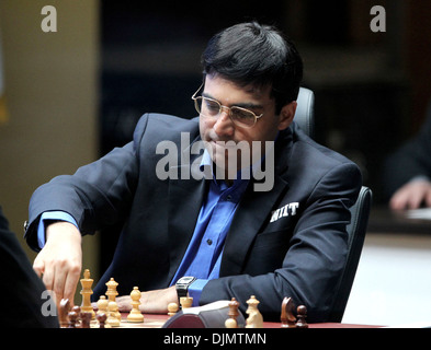 World chess champion Viswanathan Anand of India holds a trophy at an award  presentation ceremony of the FIDE World Chess Championship in Moscow,  Russia, Thursday, May 31, 2012. Anand oretained his title