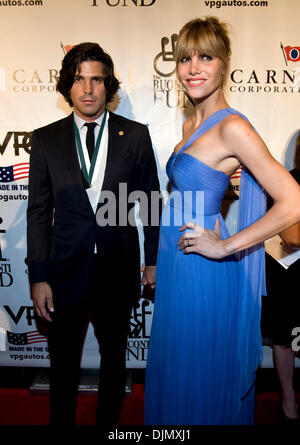 Sept. 27, 2010 - New York, NY, USA - IGNACIO ''NACHO'' FIGUERAS and DELPHINE FIGUERAS at the 25th Annual Great Sports Lends Dinner, which benefits the Buoniconti Fund to Cure Paralysis, at the Waldorf Astoria Hotel.  This year's honorees are Willie Mays, Bill Russell, Michael Irvin, Dan Marino, Annika Sorenstam, Brian Leetch, Ignacio ''Nacho'' Figueras, Laird Hamilton and Calvin Bo Stock Photo