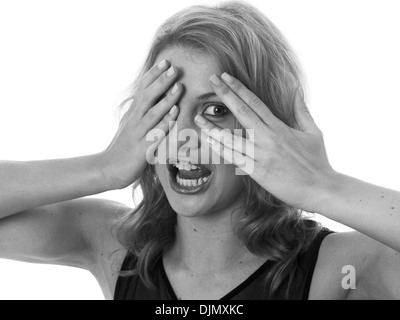 Model Released. Frightened Scared Young Woman Stock Photo