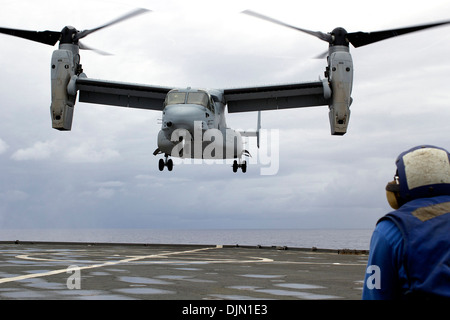 An MV-22B Osprey tiltrotor aircraft from Marine Medium Tiltrotor Squadron (VMM) 262 prepares to land on the flight deck of the amphibious dock landing ship USS Germantown (LSD 42). Aboard the Osprey was the U.S. ambassador to The Republic of the Philippin