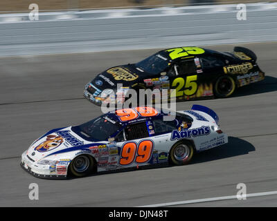 Mar 08, 2008 - Hampton, Georgia, USA - NASCAR 2008 - DAVID REUTIMANN (#99) and BOBBY HAMILTON JR. (#25) race for position during the Nicorette 300 at Atlanta Motor Speedway on Saturday, March 8, 2008. (Credit Image: © Timothy L. Hale/ZUMA Press) Stock Photo