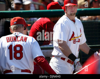 Mar 13, 2008 - Jupiter, Florida, USA -St. Louis Cardinals outfielder CHRIS DUNCAN, (R), and his father pitching coach DAVE DUNCAN (L), during a spring training game against the New York Mets at Roger Dean stadium Thursday in Jupiter.   (Credit Image: © Bill Ingram/Palm Beach Post/ZUMA Press) RESTRICTIONS: * USA Tabloids Rights OUT * Stock Photo