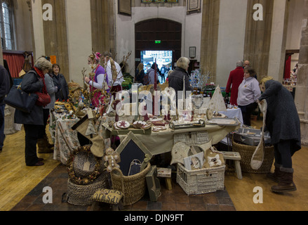 A craft fair inside the de-consecrated church of St Peter's in Sudbury, Suffolk, England. Stock Photo