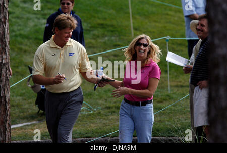 Mar 06, 2008 - Tarpon Springs, Florida, USA - MARY JO SCHMIDT, right, of Palm Harbor is happy about getting an autograph from PGA golfer ERNIE ELS, left, during the Progress Energy Pro-Am, on the Copperhead Course in the PODS Championship at the Innisbrook Resort and Golf Club. (Credit Image: Stock Photo