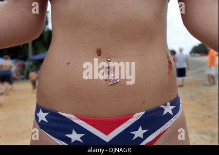 Mar 11, 2008 - East Dublin, Georgia, USA - Megan Lever sports a Confederate Battle Flag navel ring while attending the 13th annual Summer Redneck Games at Buckeye Park in East Dublin, Georgia, on Saturday. The annual homage to Southerners, began as a spoof to the 1996 Summer Olympics in Atlanta. Thousands of revelers attend the event whose events include bobbing for pigs feet, the  Stock Photo