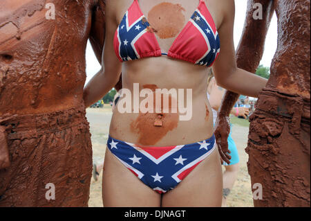 Mar 11, 2008 - East Dublin, Georgia, USA - Megan Lever sports a Confederate Battle Flag navel ring and bikini while attending the 13th annual Summer Redneck Games at Buckeye Park in East Dublin, Georgia, on Saturday. The annual homage to Southerners, began as a spoof to the 1996 Summer Olympics in Atlanta. Thousands of revelers attend the event whose events include bobbing for pigs Stock Photo