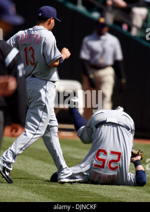 Cleveland Indians Second Baseman Mike Rouse, Left, Flips Over Minnesota 