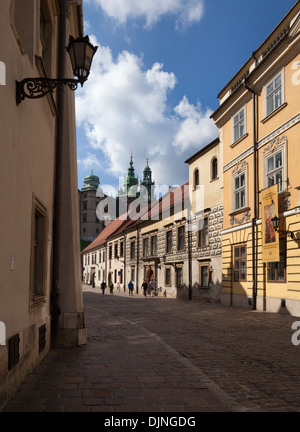 Kanonicza Street & Archdiocese Museum, where Father Karol Wojtyla (Pope John Paul II) lived, beyond - Wawel Cathedral, Krakow, Poland Stock Photo