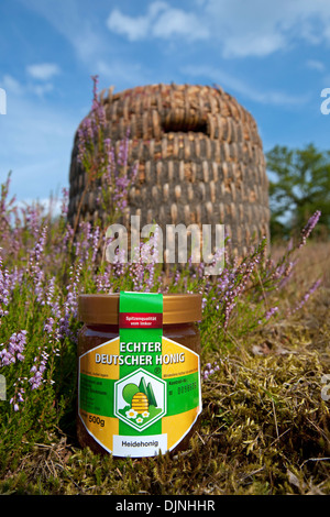 Honey jar and old beehive / skep for honeybees at apiary in the Lüneburg Heath / Lunenburg Heathland, Lower Saxony, Germany Stock Photo - Alamy