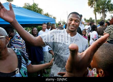 Apr 26, 2008 - Delray Beach, Florida, USA - Former Atlantic High star BRANDON FLOWERS receives congratulations during a draft party at his house in Delray Beach Saturday after being picked as the 35th pick in the NFL draft.   Flowers was chosen by the Kansas City Chiefs.  (Credit Image: Â© Lannis Waters/Palm Beach Post/ZUMA Press) RESTRICTIONS: * U.S. Tabloid Rights OUT * Stock Photo