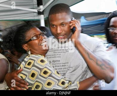 Apr 26, 2008 - Delray Beach, Florida, USA -  Former Atlantic High star BRANDON FLOWERS is hugged by his mother PATRICIA FLOWERS as it's announced he is the second round pick of the Kansas City Chiefs during a draft party at his house in Delray Beach Saturday.  (Credit Image: Â© Lannis Waters/Palm Beach Post/ZUMA Press) RESTRICTIONS: * U.S. Tabloid Rights OUT * Stock Photo