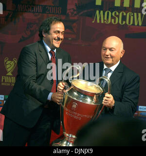 Apr 30, 2008 - St. Petersburg, Russia - The 2008 UEFA Champions League Final will be played on 21 May 2008 at the Luzhniki Stadium in Moscow, Russia. Pictured: FILE April 3, 2008, (L-R) UEFA President MICHEL PLATINI and mayor of Moscow YURI LUZHKOV with UEFA CUP. Platini brought the UEFA Cup to Moscow (Credit Image: © PhotoXpress/ZUMA Press) RESTRICTIONS: * North and South America  Stock Photo