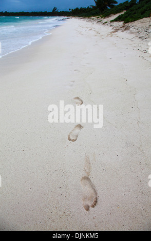 Footprints in the sand on the beach at Riviera Maya Cancun Quintana Roo Yucatan Peninsular Mexico North America Stock Photo