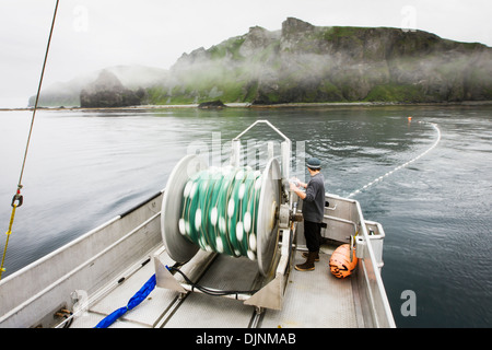 Motion Blur Of Setting Out The Gillnet While Commercial Salmon Fishing Near Cape Pankof On Unimak Island. Stock Photo