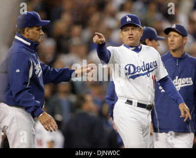 Oct 12, 2008 - Los Angeles, California, USA - Los Angeles Dodgers Manager JOE TORRE tries to hold back third base coach LARRY BOWA during third inning altercation with the Phillies during game three of the NLCS at Dodger Stadium. The Phillies lost to the Dodgers 7-2. (Credit Image: © Yong Kim/Philadelphia DailyNews/ZUMA Press) Stock Photo