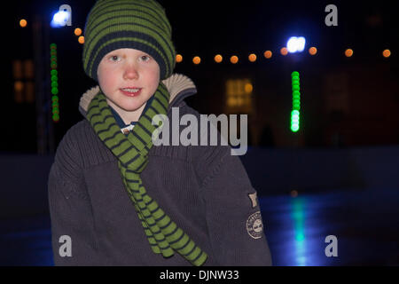 Hampton Court, London, UK. 29th November 2013. Ice skaters Tabitha Barlow, 8 and Albie Barlow, 5, test out the Hampton Court Palace Ice Rink ahead of opening to the public on Saturday 30th November until the 13th of January Credit:  Paul Davey/Alamy Live News Stock Photo