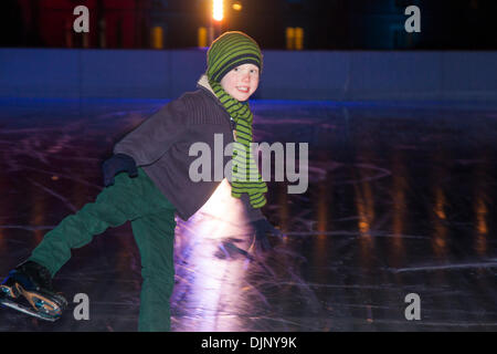 Hampton Court, London, UK. 29th November 2013. Ice skaters Tabitha Barlow, 8 and Albie Barlow, 5, test out the Hampton Court Palace Ice Rink ahead of opening to the public on Saturday 30th November until the 13th of January Credit:  Paul Davey/Alamy Live News Stock Photo