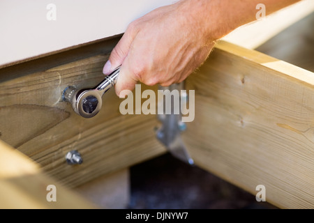 Carpenter's Hand Tightening Bolt With Wrench Stock Photo