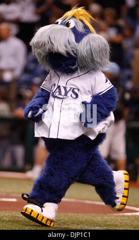 St. Petersburg, FL. USA; D.J. Kitty, one of the Tampa Bay Rays mascots,  greets arriving fans during a major league baseball game between the Tampa  Bay Rays and the Minnesota Twins, Friday