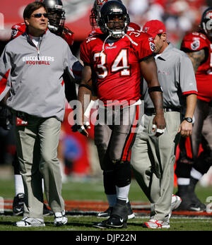 Tampa Bay Buccaneers vs. Carolina Panthers. Fans support on NFL Game.  Silhouette of supporters, big screen with two rivals in background. Stock  Photo