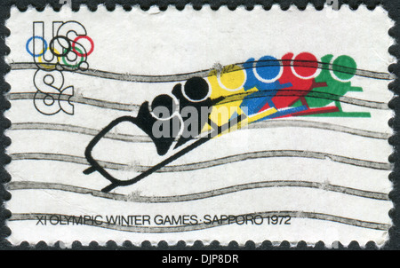 A postage stamp printed in the USA, dedicated to the 11th Winter Olympic Games, Sapporo, Japan, shows Bobsledding Stock Photo