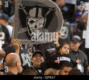 Oct. 16, 2011 - Oakland, California, U.S - Raiders fans hold up a shield  dedicated to Al Davis before the NFL game between the Cleveland Browns and  the Oakland Raiders at O.co