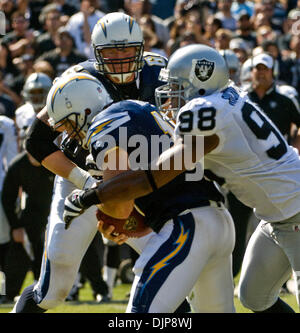 Sep 28, 2008 - OAKLAND, CA, USA - Oakland Raiders defensive end JAY RICHARDSON #98 sacks San Diego Chargers quarterback PHILIP RIVERS #17 during a game at McAfee Coliseum. (Credit Image: © AL GOLUB/Golub Photography/Golub Photography) Stock Photo