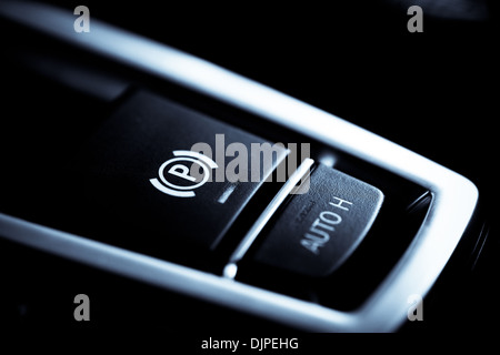 Close-up shot with the detail of a parking brake in a car Stock Photo