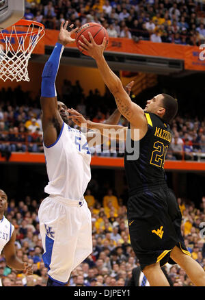 Mar. 27, 2010 - Syracuse, Kentucky, USA - Kentucky's  Patrick Patterson blocked the shot of West Virginia's Joe Mazzulla,21,    as Kentucky played West Virginia's on Saturday March 27, 2010 in Syracuse, NY. Photo by Mark Cornelison | Staff. (Credit Image: © Lexington Herald-Leader/ZUMApress.com) Stock Photo